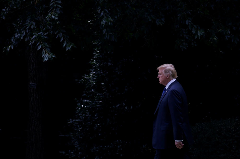 US President Donald Trump boards Marine One to depart for travel to New Jersey from the South Lawn of the White House in Washington, U.S., July 20, 2018. (REUTERS/Leah Millis)