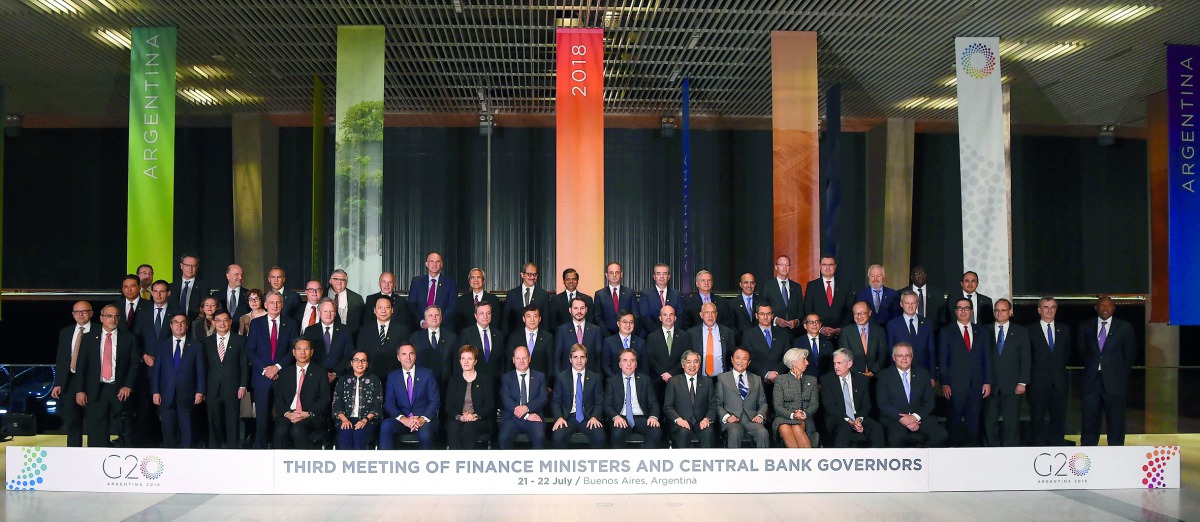 Family picture of Finance Ministers and Central Bank Governors of the G20, during their meeting in Buenos Aires, on July 21, 2018 .  AFP / Eitan Abramovich