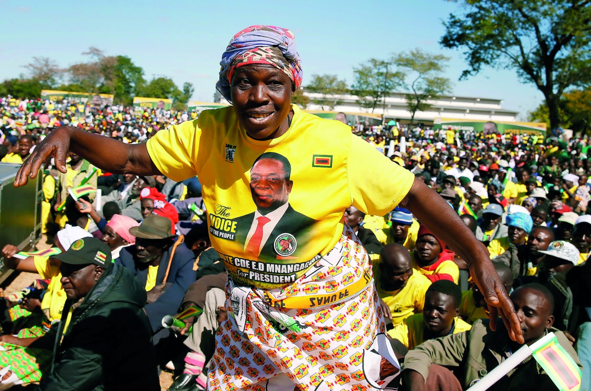 Supporters of President Emmerson Mnangagwa's ruling ZANU (PF) party attend an election rally in Mhondoro, Zimbabwe July 24. Reuters/Philimon Bulawayo