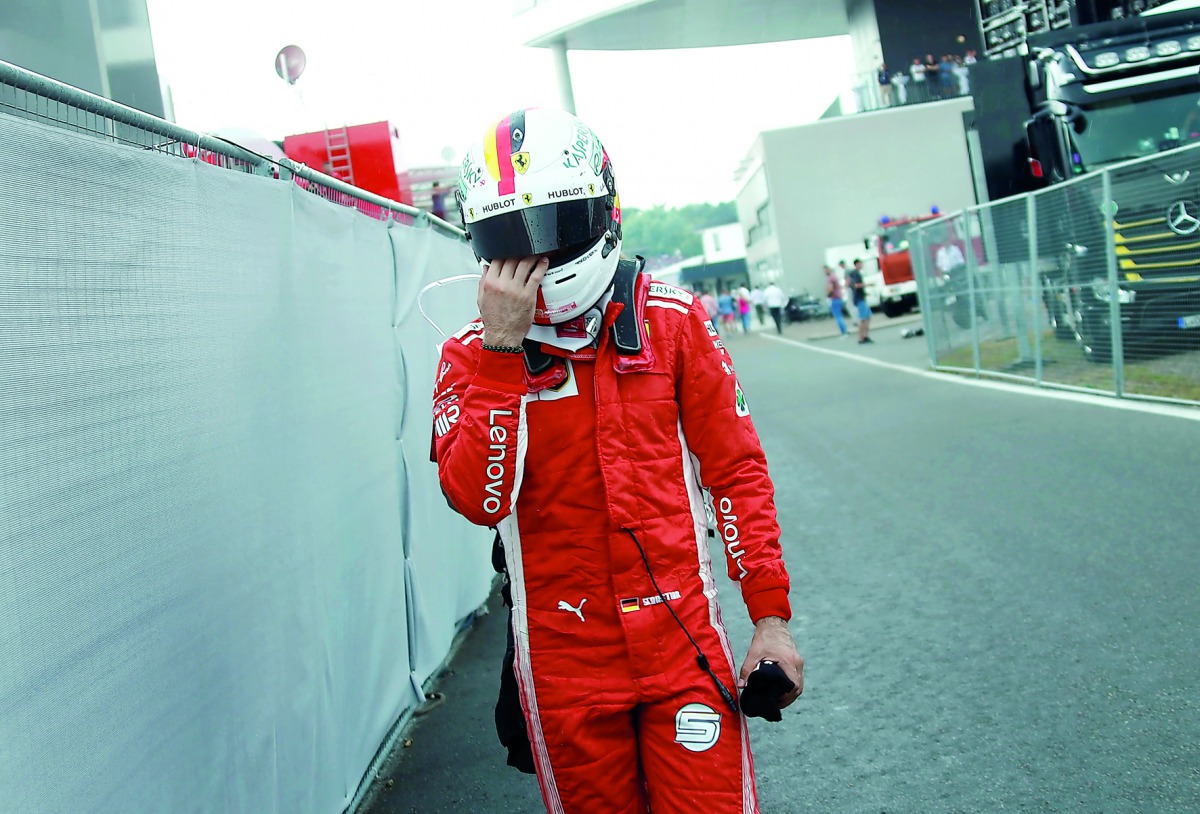 Ferrari’s Sebastian Vettel after crashing out of the race Reuters/Ralph Orlowski  