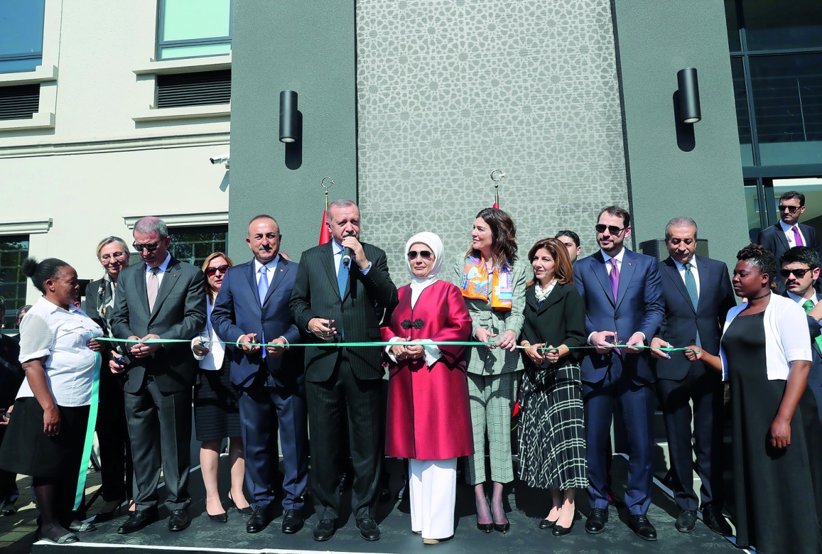 President of Turkey Recep Tayyip Erdogan (4th L), his wife Emine Erdogan (6th R), Turkish Treasury and Finance Minister Berat Albayrak (3rd R) and Turkey's National Defense Minister Hulusi Akar (2nd L) and Turkish Foreign Affairs Minister Mevlut Cavusoglu