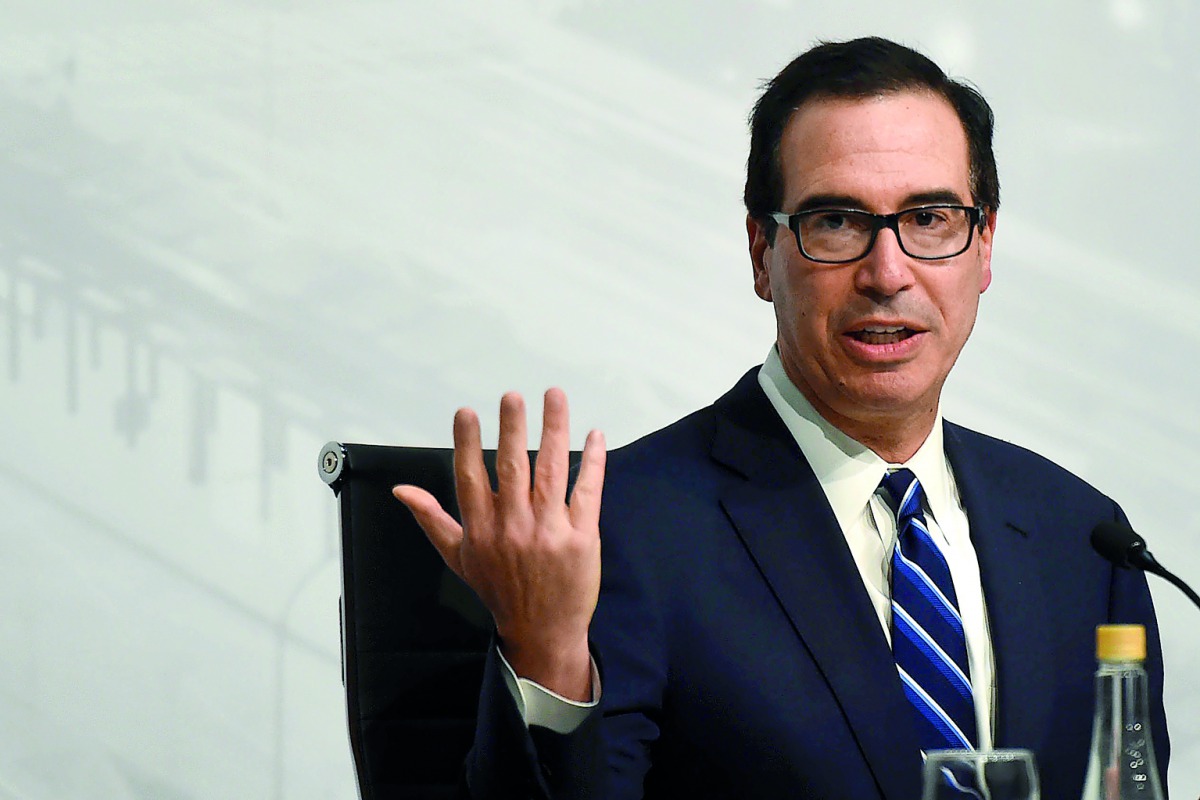In this file photo taken on July 22, 2018 US Secretary of the Treasury Steven Mnuchin, gestures during a press conference in Buenos Aires, at the end of the G20 Finance Ministers and Central Bank Governors meeting.  AFP / Eitan Abramovich