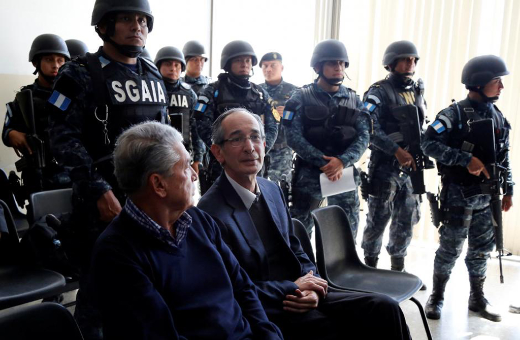 File photo of former Guatemalan President Alvaro Colom looks on during a court hearing after being detained as part of a local corruption investigation, in Guatemala City, Guatemala February 13, 2018. REUTERS/Luis Echeverria.