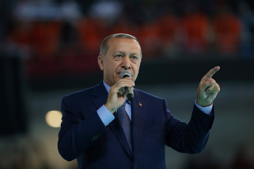 Turkish President Tayyip Erdogan makes a speech during a meeting of his ruling AK Party in Ankara, Turkey August 4, 2018. (Murat Kula/Presidential Palace/Handout via REUTERS)