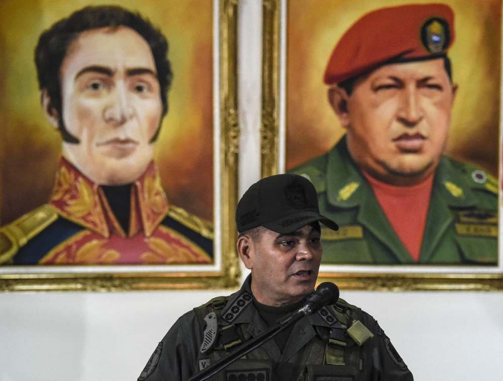 Venezuelan Defence Minister Padrino Lopez delivers a press conference in Caracas on August 05, 2018, a day after an alleged attack using explosive-laden drones during a military parade took place.  AFP / Juan Barreto 