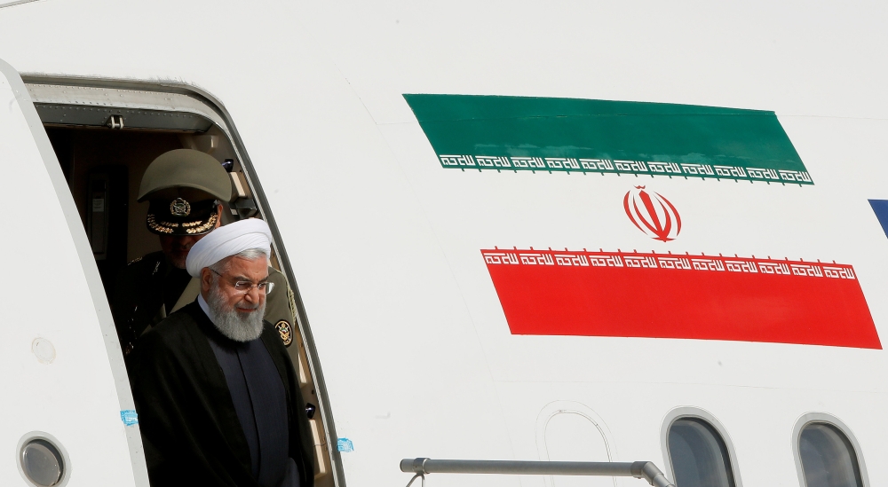 Iranian President Hassan Rouhani disembarks from a plane upon his arrival at the airport in Zurich, Switzerland, July 2, 2018. Reuters/Arnd Wiegmann