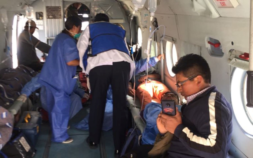 A person is transported in a helicopter after eating contaminated food at a funeral in the Peruvian Andes, authorities said on Tuesday, in Ayacucho, Peru, in this undated photo released August 7, 2018. Courtesy of Agencia Andina/Coen Handout via Reuters