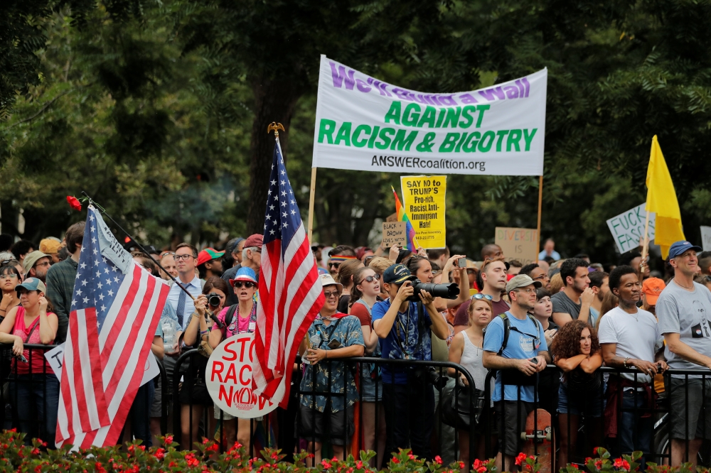 Counter-protesters near a rally by white nationalists marking the one year anniversary of the 2017 Charlottesville 