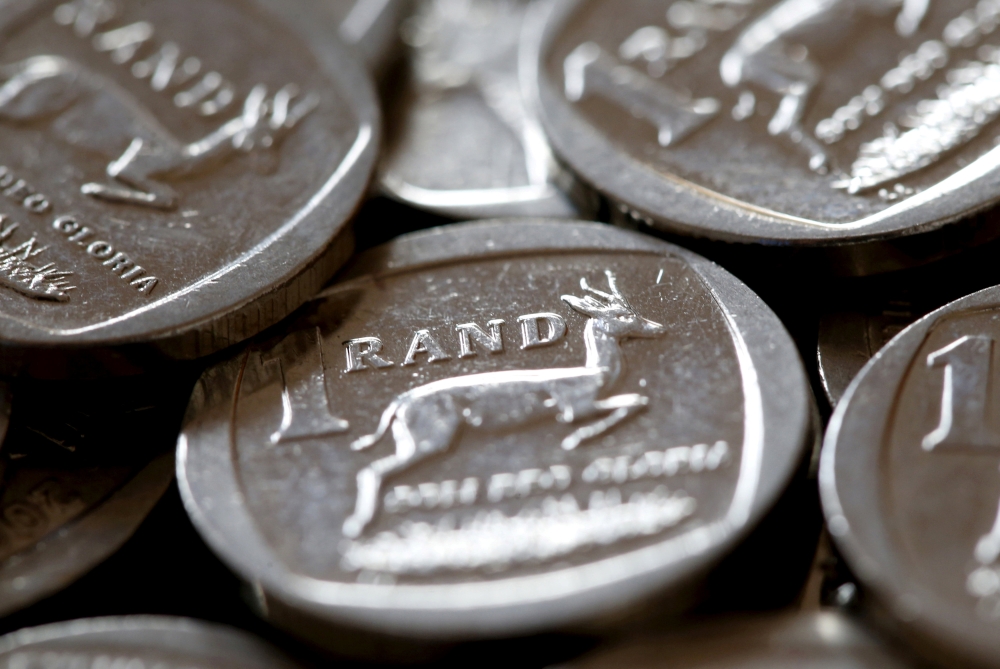 South African rand coins are seen in this photo illustration taken September 9, 2015. Reuters/Mike Hutchings