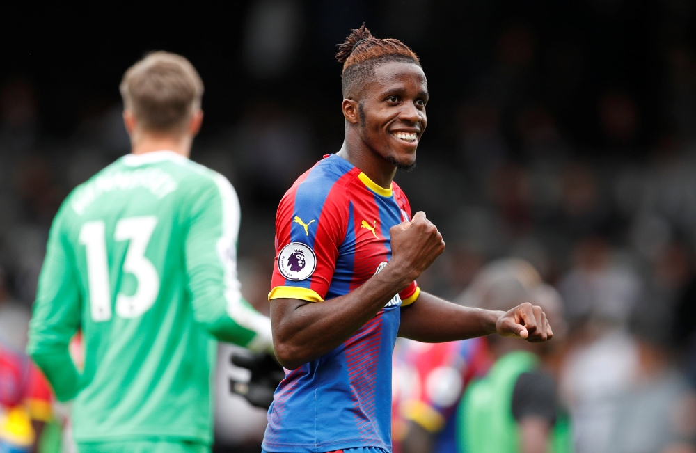 Crystal Palace's Wilfried Zaha celebrates after the match, August 11, 2018. Action Images via Reuters/John Sibley