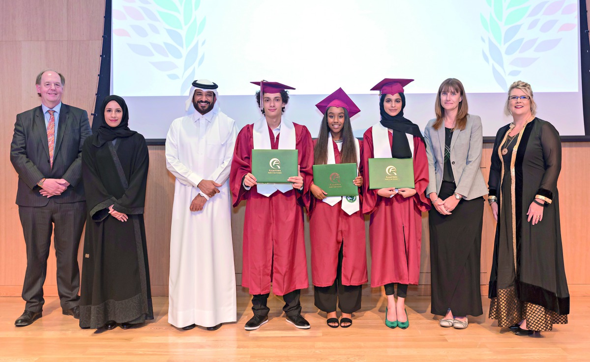 QA Sidra International Baccalaureate Diploma Programme graduates with officials.
