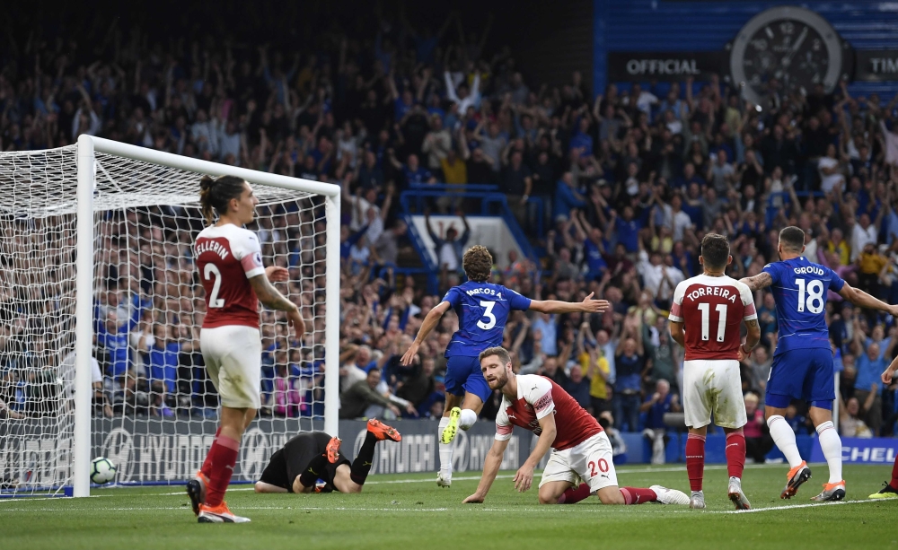  Chelsea's Marcos Alonso celebrates scoring their third goal. (REUTERS/Toby Melville)