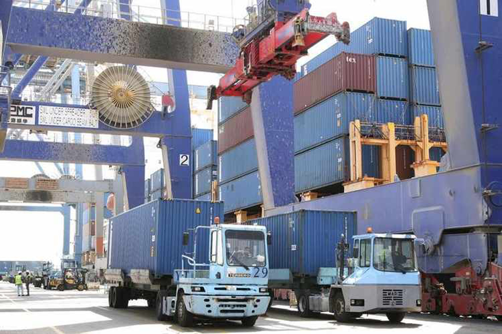 Image used for illustrative purpose. Trucks carrying containers are seen at the Port of Aqaba