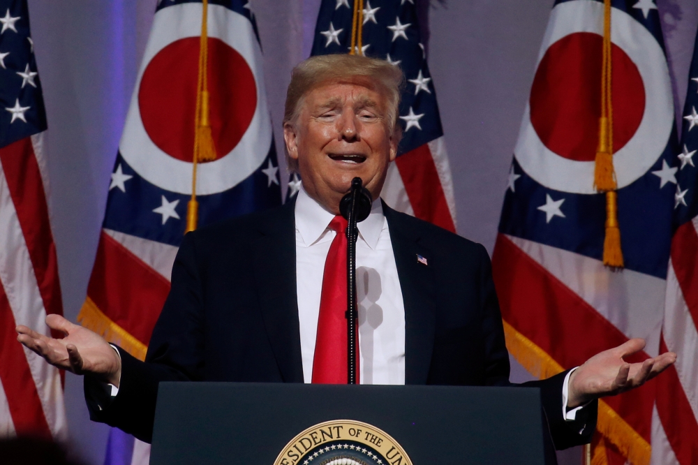 U.S. President Trump delivers remarks at the Ohio Republican Party State Dinner in Columbus, Ohio, U.S., August 24, 2018. REUTERS/Leah Millis