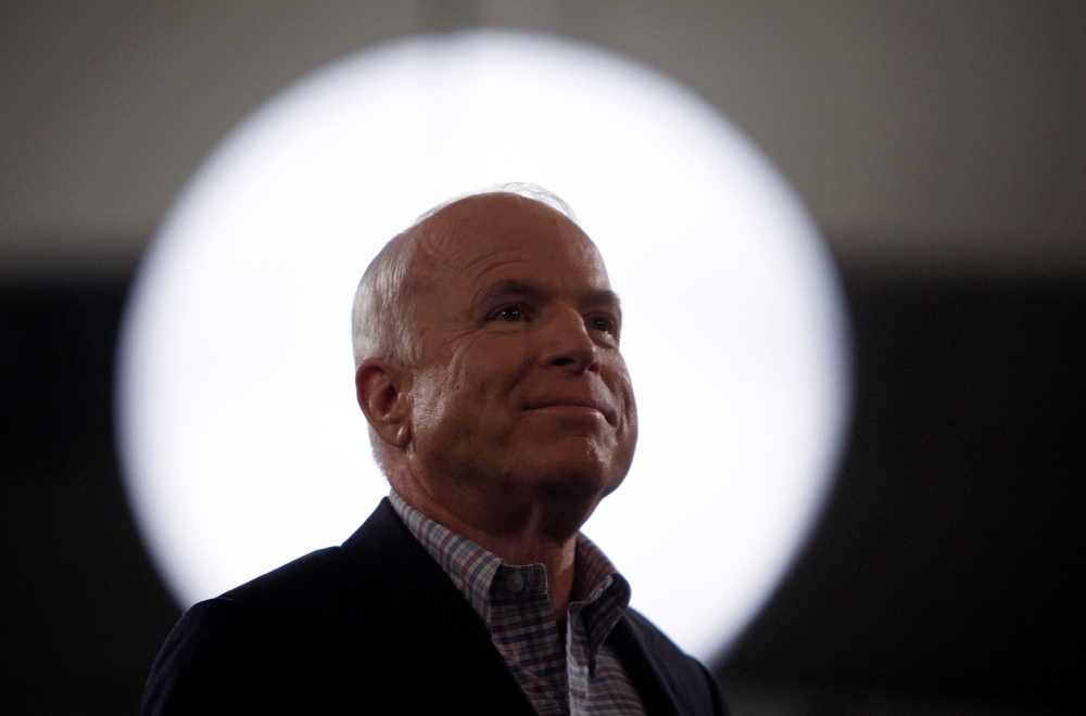 File photo of US Republican presidential nominee Sen. John McCain (R-AZ) smiles during a rally in Concord, North Carolina October 18, 2008. REUTERS/Carlos Barria/File Photo