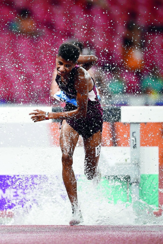 Qatar’s Yaser Bagharab competes in the final of the men’s 3000m steeplechase athletics event during the 2018 Asian Games in Jakarta on August 27, 2018.