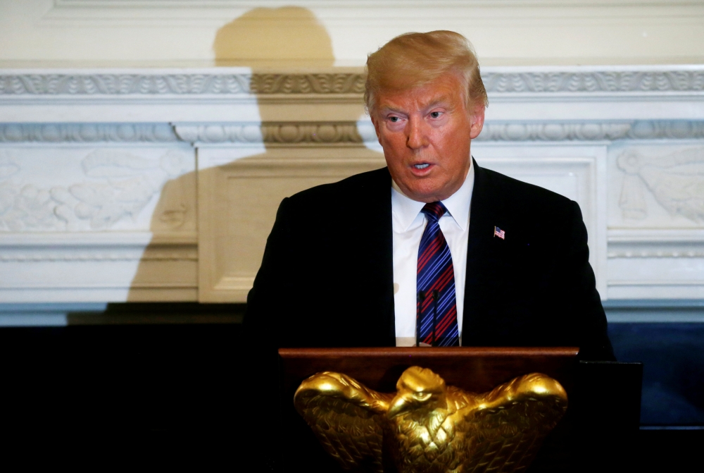 US President Donald Trump speaks at a dinner to honor evangelical leadership in the State Dining Room at the White House in Washington, D.C., US August 27, 2018. REUTERS/Leah Millis