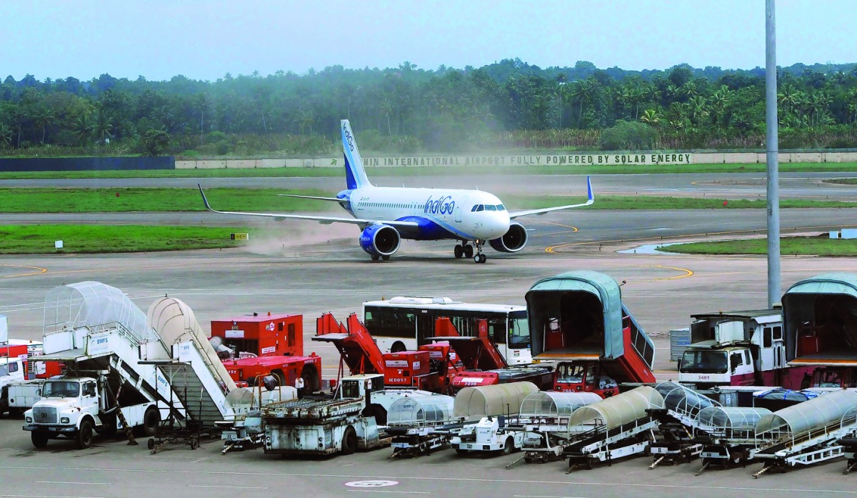 A plane is seen at the taxiway after landing at Kochi's International airport in the Indian state of Kerala on August 29, 2018, after the airport reopened following flooding caused by monsoon rains.  AFP