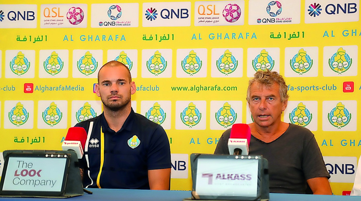 Al Gharafa head coach Christian Gourcuff (right) and team’s star player Wesley Sneijder during a pre-match press conference, yesterday.    