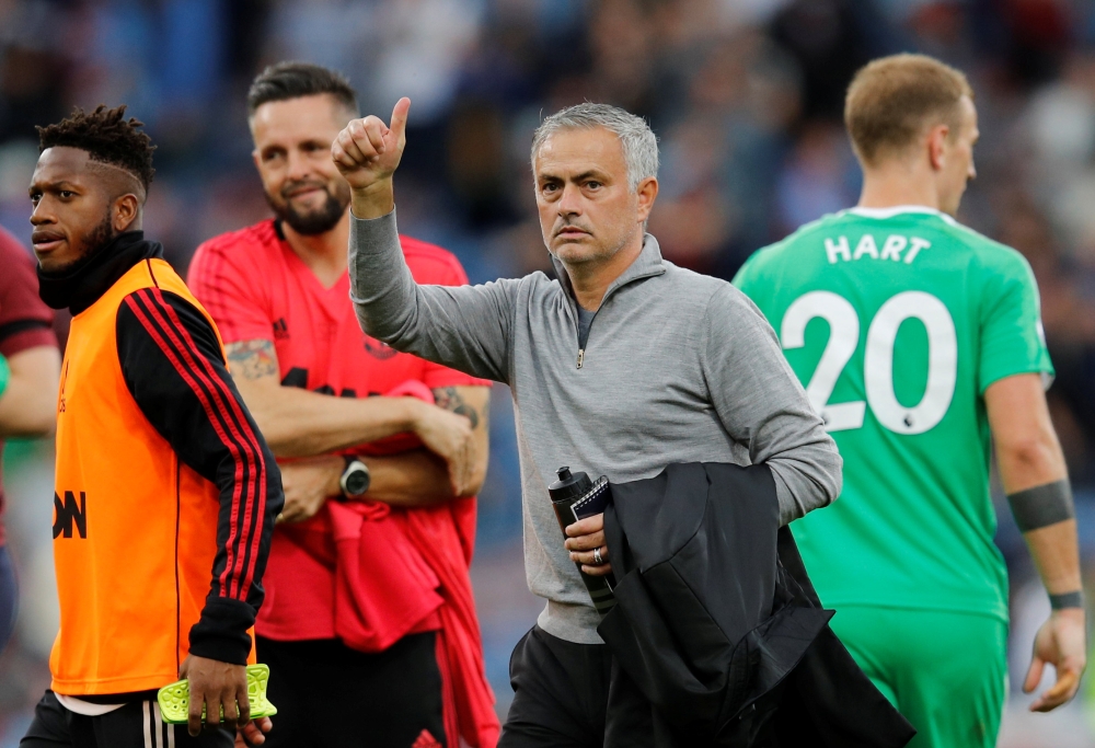 Manchester United manager Jose Mourinho celebrates after the match REUTERS/Phil Noble 