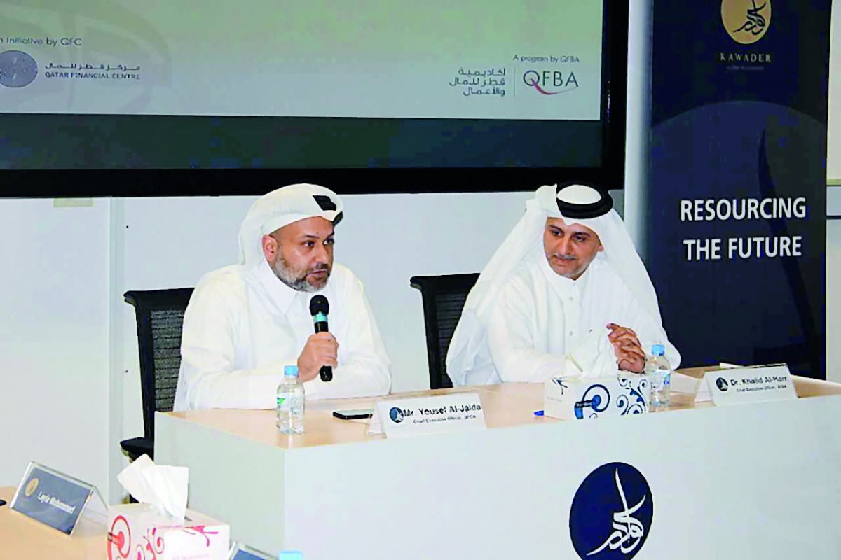 Yousuf Mohamed Al Jaida (left), CEO of the QFC Authority, speaking at the launch of sixth cohort of Kawader programme as Dr Khalid Mohamed Al Horr, QFBA CEO, looks on.
