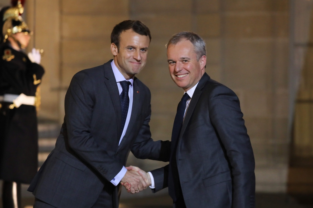 (FILES) In this file photo taken on November 20, 2017 French president Emmanuel Macron (L) welcomes National Assembly President Francois de Rugy for a meeting at the Elysee Palace in Paris. AFP / LUDOVIC MARIN