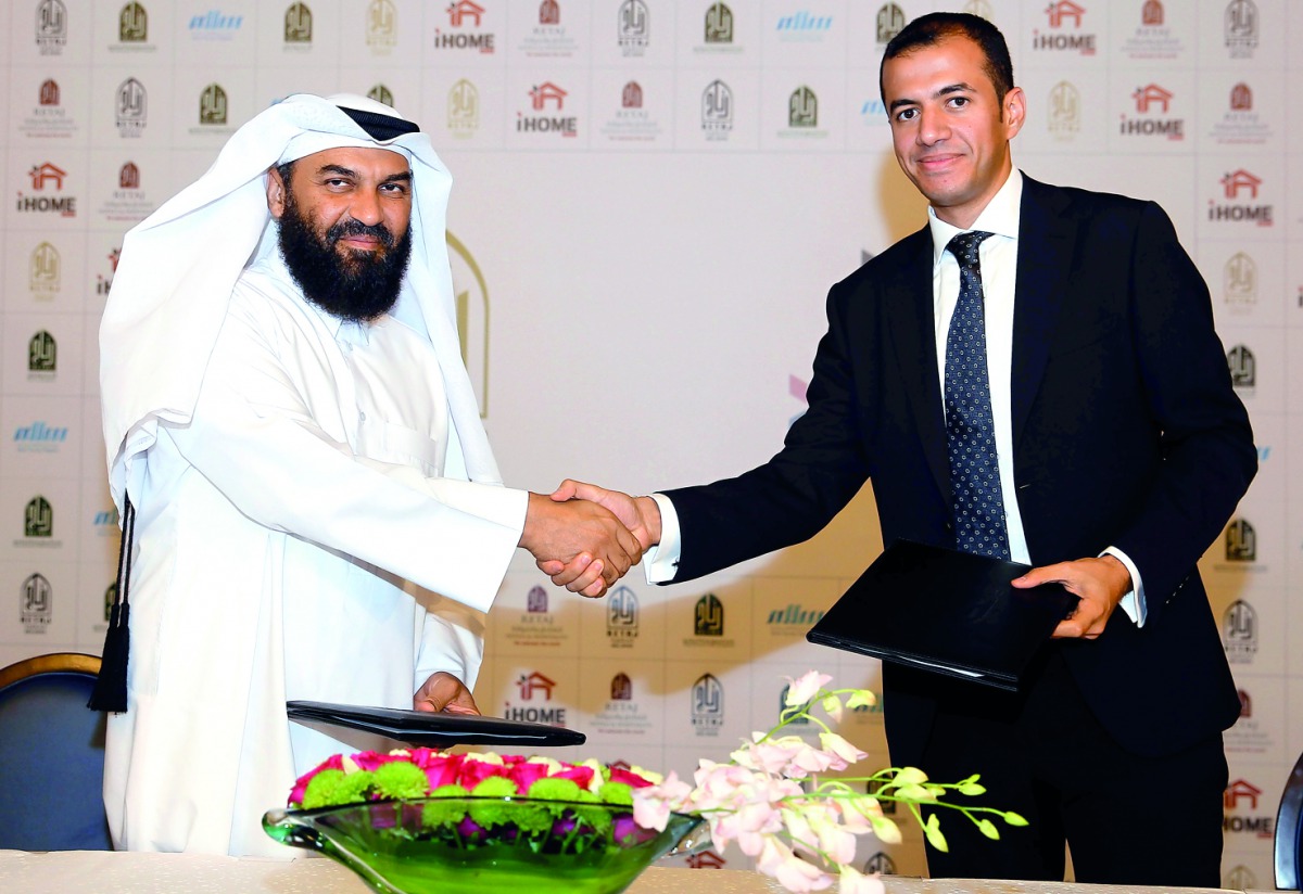 Dr Mohamed bin Johar Al Mohamed (left), Vice-Chairman and Managing Director of Retaj Group, and Abdulrahman Shusha, General Manager of Ihome Insaat shaking hands after signing the agreement at Retaj Resorts, Salwa Road. Pic: Qassim Rahmatullah/The Peninsu