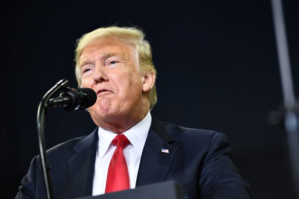 FILE PHOTO:   US President Donald Trump. AFP / MANDEL NGAN
