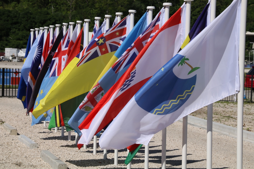 This picture taken on September 5, 2018 shows flags from the Pacific Islands countries being displayed in Yaren on the last day of the Pacific Islands Forum (PIF). AFP / Mike Leyral 