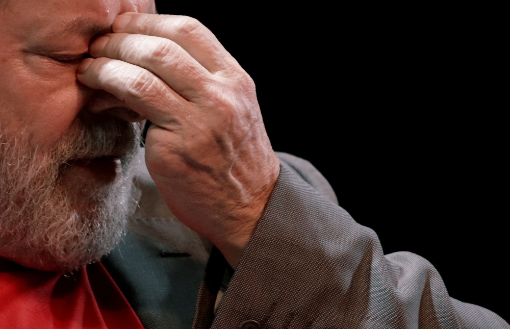 FILE PHOTO: Former Brazilian President Luiz Inacio Lula da Silva gestures during a joint rally organized by left-wing political parties in Rio de Janeiro, Brazil April 2, 2018. REUTERS/Ricardo Moraes