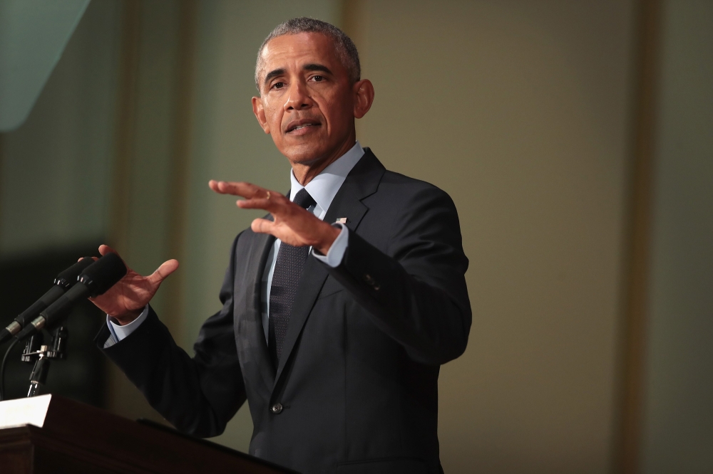 Former President Barack Obama speaks to students at the University of Illinois where he accepted the Paul H. Douglas Award for Ethics in Government on September 7, 2018 in Urbana, Illinois. Scott Olson/Getty Images/AFP