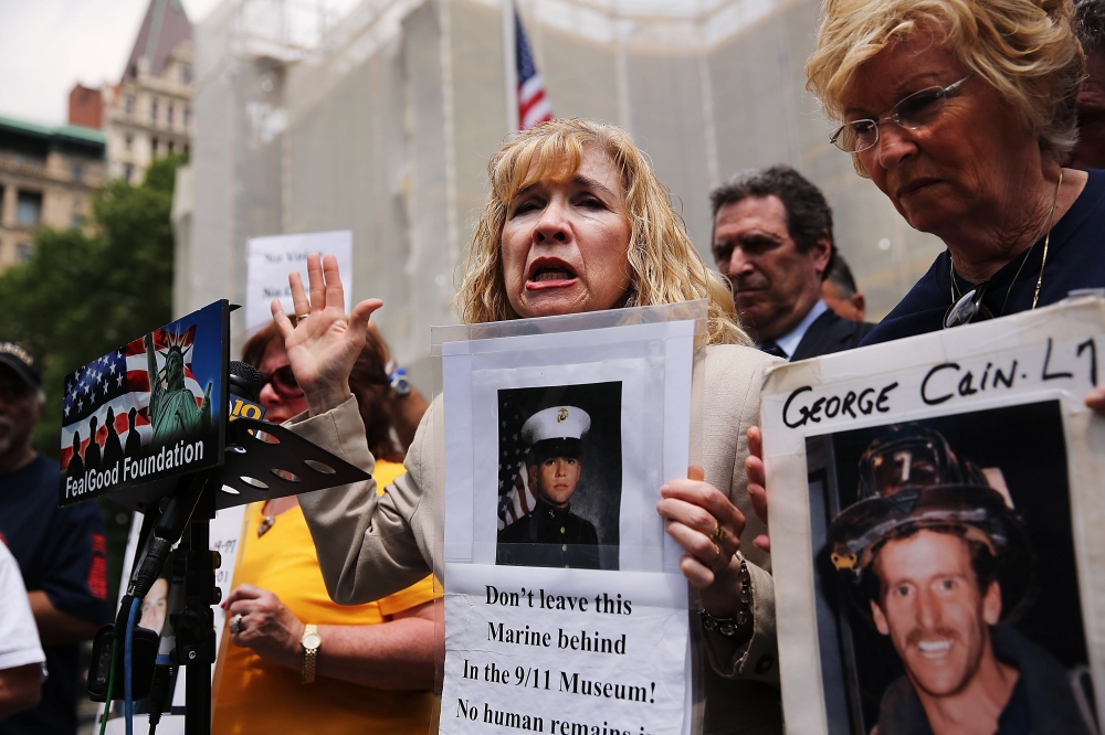 (FILES) In this file photo taken on May 26, 2014, Sally Regenhard, who lost her son on 9/11, speaks at a news conference with other family members on the steps of City Hall to criticize the placement of unidentified human remains beneath the newly opened 