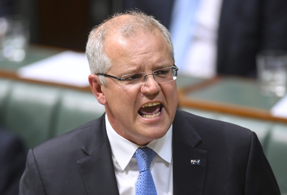 Australian Prime Minister Scott Morrison speaks in the House of Representatives at Parliament House in Canberra, Australia, September 10, 2018. AAP/Lukas Coch/via REUTERS 