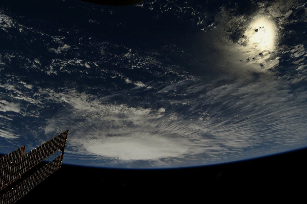 A photo taken from the International Space Station by astronaut Ricky Arnold shows Hurricane Florence over the Atlantic Ocean in the early morning hours of September 6, 2018. Picture taken September 6, 2018. Courtesy @astro_ricky/NASA/Handout via REUTERS