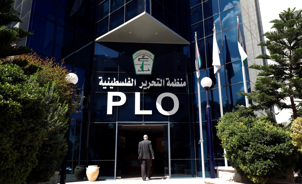 A man enters the headquarters of the Palestinian Liberation Organization (PLO), in Ramallah in the occupied West Bank September 10, 2018. REUTERS/Mohamad Torokman