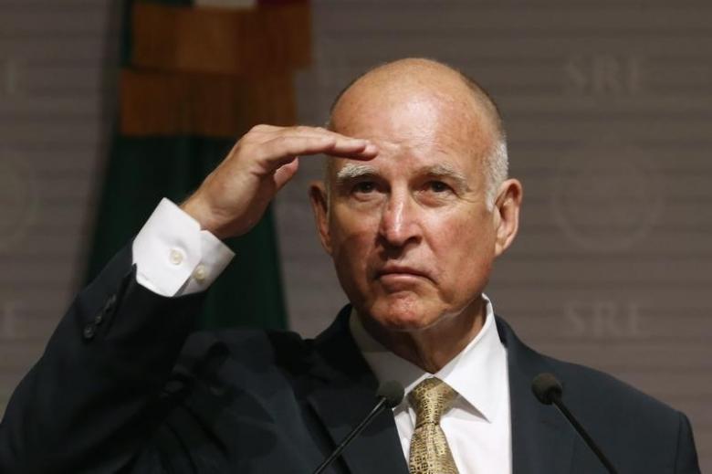 California Governor Jerry Brown gestures during a news conference at Memoria y Tolerancia museum in Mexico City July 28, 2014. Reuters/Edgard Garrido 