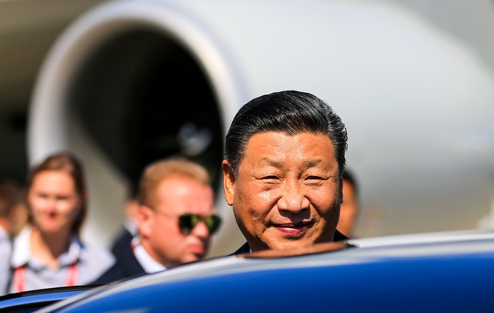 Chinese President Xi Jinping looks on during a welcoming ceremony upon his arrival to attend the Eastern Economic Forum, at Vladivostok International Airport outside Vladivostok, Russia September 11, 2018. Vladimir Smirnov/TASS Host Photo Agency/Pool via 