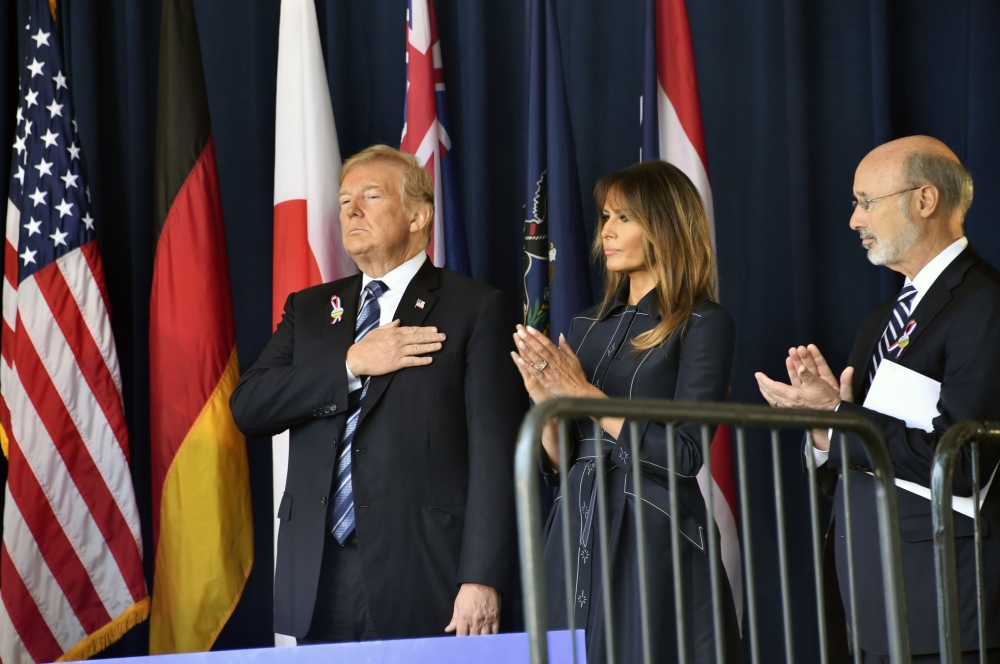 US President Donald Trump and First Lady Melania Trump arrive on September 11, 2018, to speak at the site of a new memorial in Shanksville, Pennsylvania where Flight 93 crashed during the September 11 attacks, as somber ceremonies take place at Ground Zer