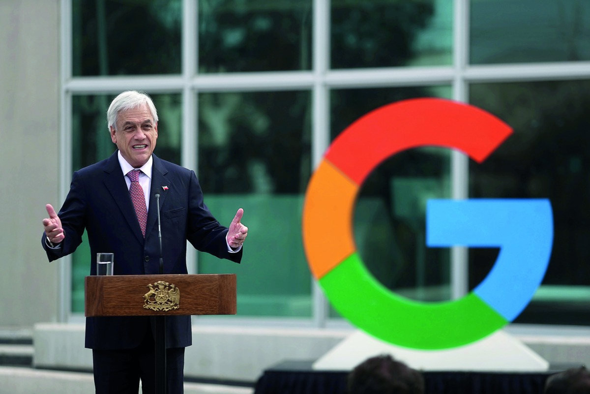 Chile's President Sebastian Pinera delivers a speech near a Google logo during the announcement of the plans for their data centre expansion in Santiago, Chile, September 12, 2018. Reuters/Ivan Alvarado 