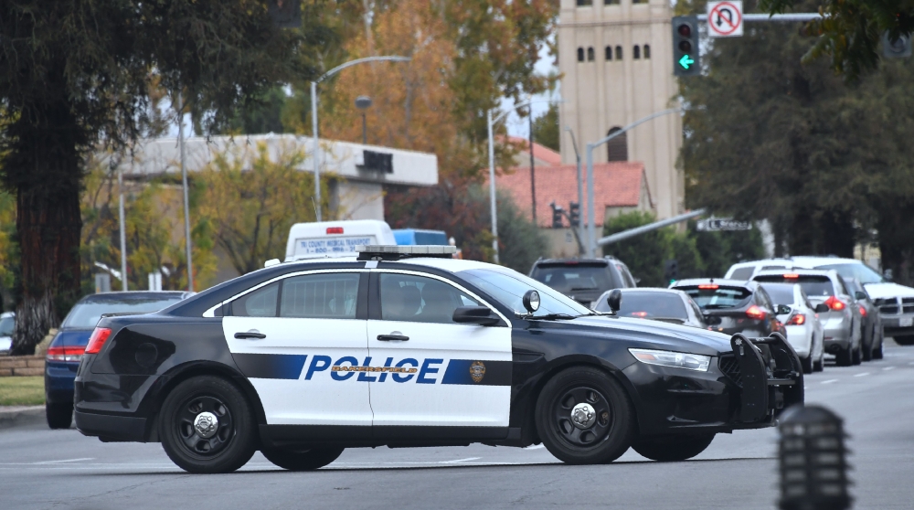 (FILES) In this file photo taken on November 17, 2017 A Bakersfield police vehicle makes patrols in Bakersfield, Kern County, California. AFP / FREDERIC J. BROWN