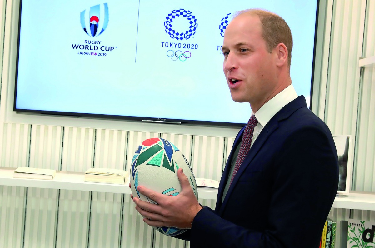 Britain's Prince William holds an official rugby ball for the Rugby World Cup 2019 at the official opening of Japan House in London, Britain, September 13, 2018. Tim P. Whitby via Reuters 