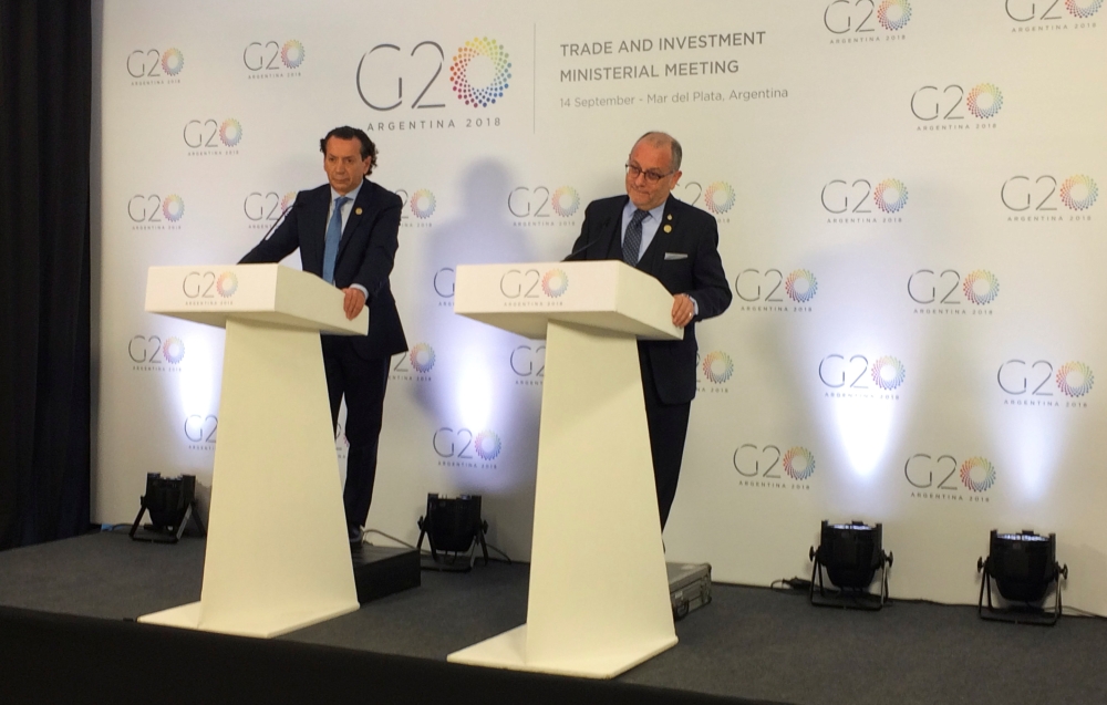 Argentina's Production Minister Dante Sica (L) and Foreign Minister Jorge Faurie attend a news conference at the G20 Trade and Investment Meeting in Mar del Plata, Argentina, September 14, 2018. REUTERS/Scott Squires