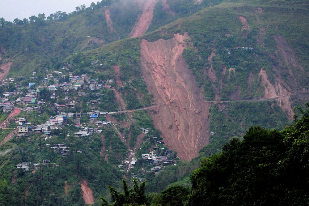 A view of landslide caused at the height of Typhoon Mangkhut that buried people at a mining camp in Itogon, Benguet in the Philippines, September 16, 2018. Reuters/Harley Palangchao