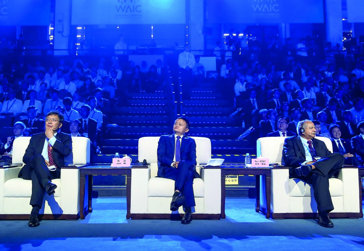 (L to R) Microsoft Executive Vice President of Technology and Research Harry Shum, Alibaba Group Executive Chairman Jack Ma and Foreign Academician of the Chinese Academy of Engineering Raj Reddy attend the main forum of the World Artificial Intelligence 