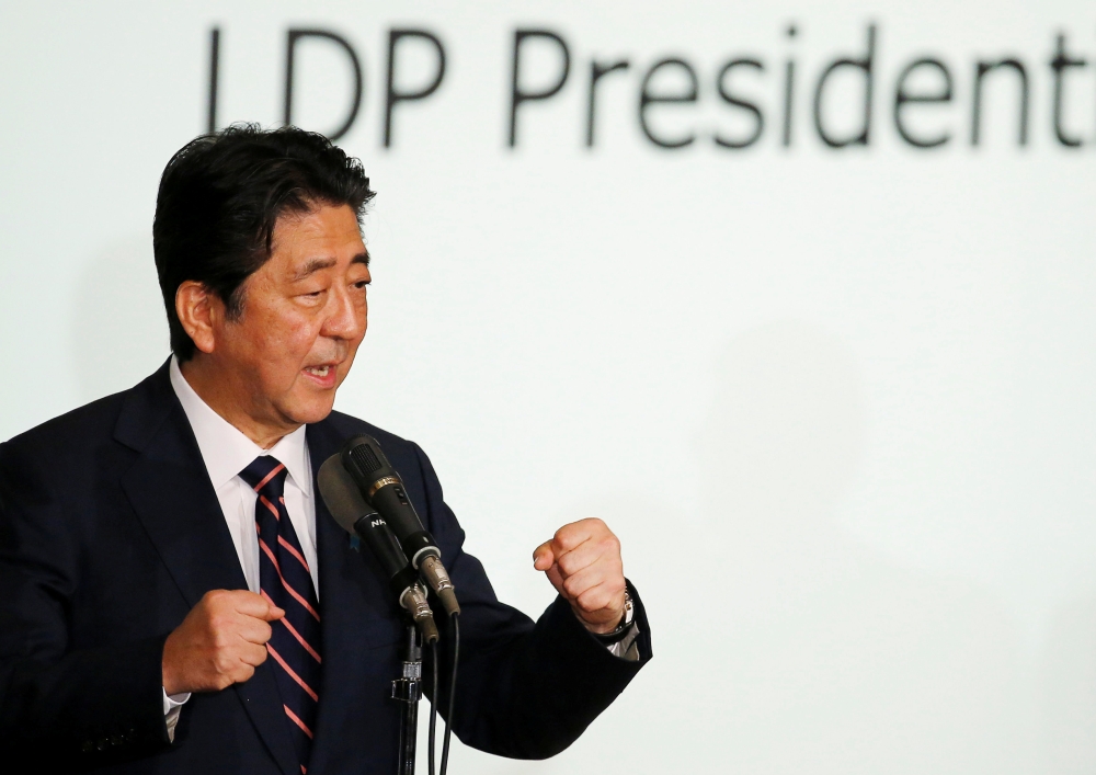 Japan's Prime Minister Shinzo Abe, who is also the ruling Liberal Democratic Party leader's (LDP) leader, speaks after winning the leadership vote at the party's headquarters in Tokyo, Japan September 20, 2018. REUTERS/Toru Hanai