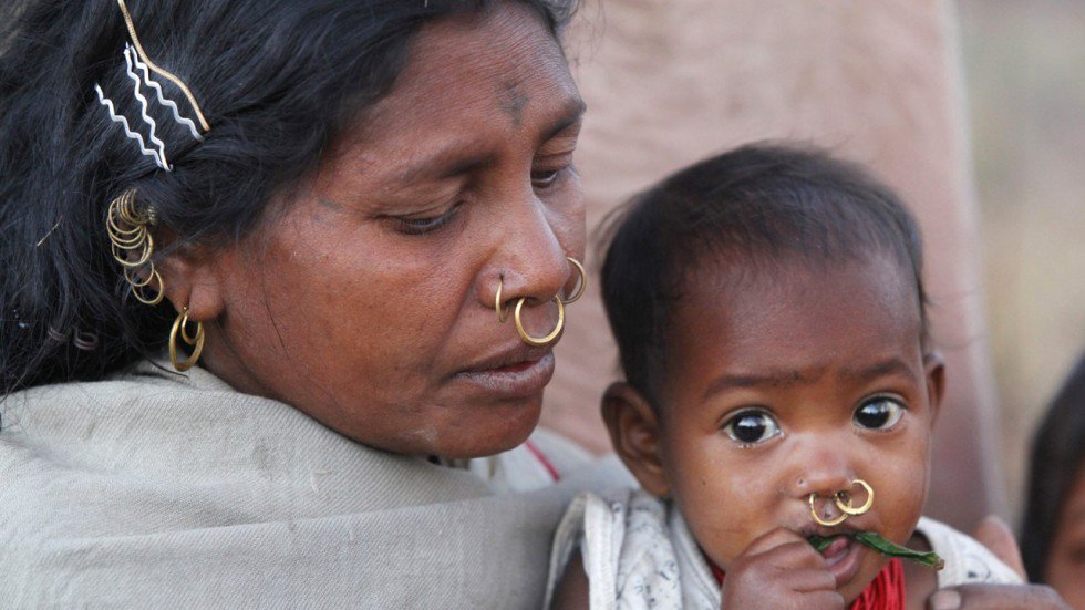 Members of the Dongria Kondh tribe gather on top of the Niyamgiri mountain, which they worship as their living god, to protest against plans by Vedanta Resources to mine bauxite from that mountain near Lanjigarh in India's Orissa state February 21, 2010. 