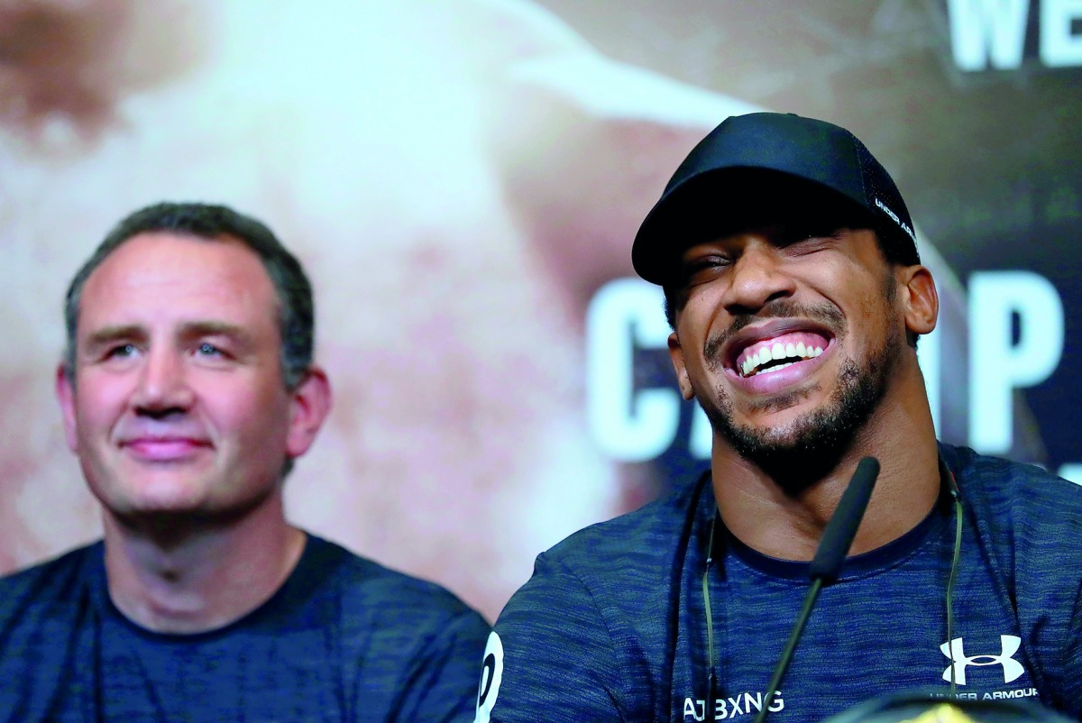 Trainer Robert McCracken and Anthony Joshua during a press conference September 20, 2018, London. Action Images via Reuters/Andrew Couldridge 