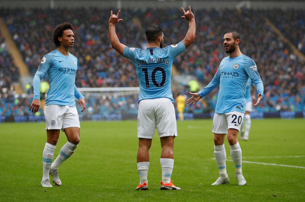 Manchester City's Bernardo Silva celebrates scoring their second goal with Sergio Aguero and Leroy Sane Action Images via Reuters/Andrew Boyers  
