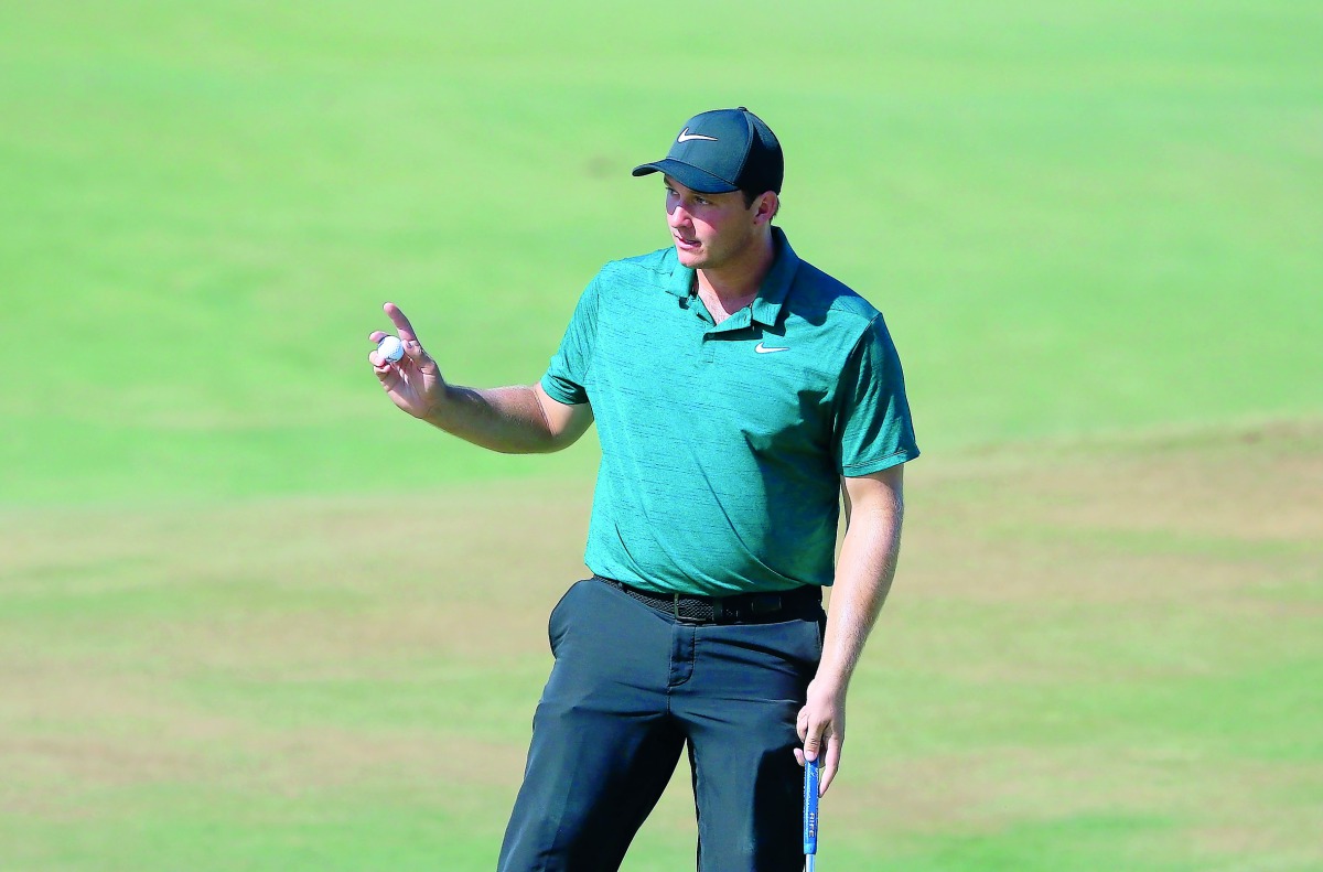 Sepp Straka of Austria celebrates his birdie on the 18th green during the third round of the Web.com Tour Championship held at Atlantic Beach Country Club on September 22, 2018 in Atlantic Beach, Florida. Michael Cohen/Getty Images/AFP