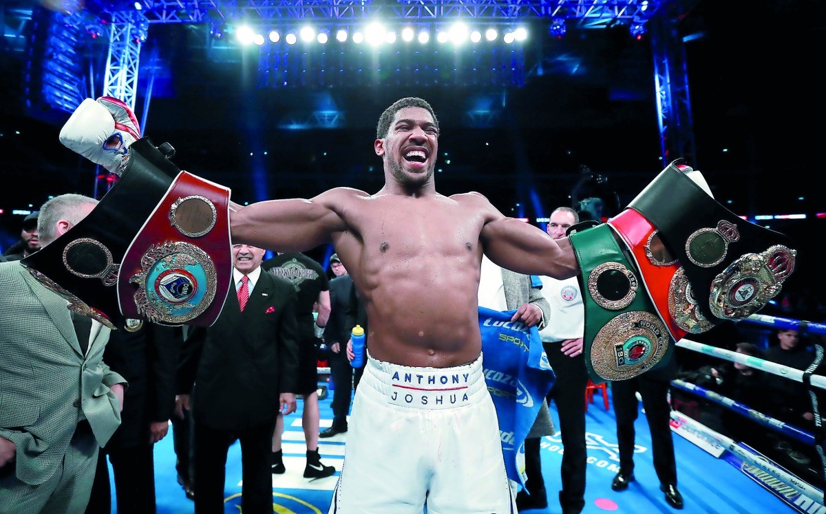 Anthony Joshua celebrates his win against Alexander Povetkin. Action Images via Reuters/Andrew Couldridge 